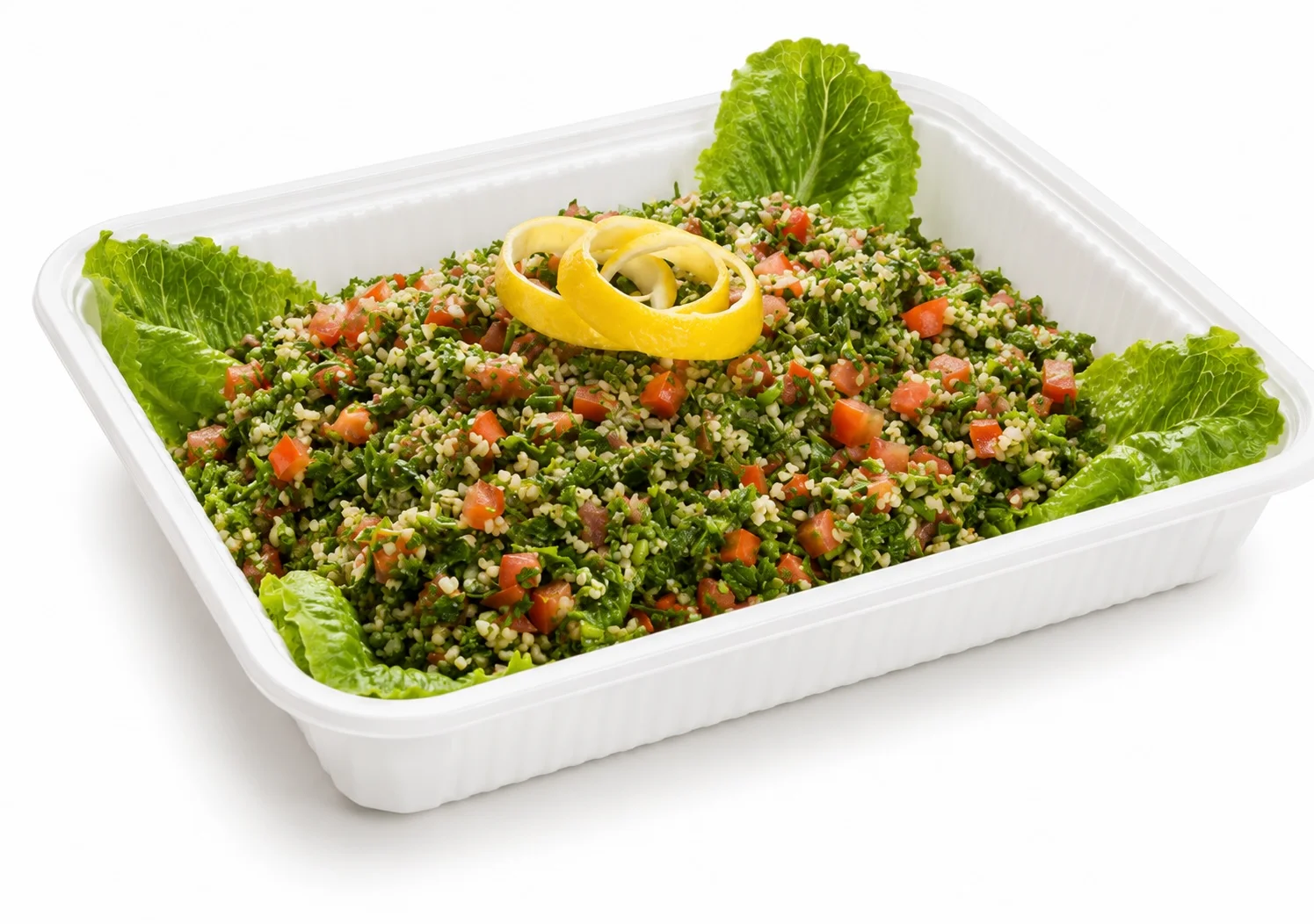Fresh tabbouleh salad with parsley tomato bulgur and lemon garnish