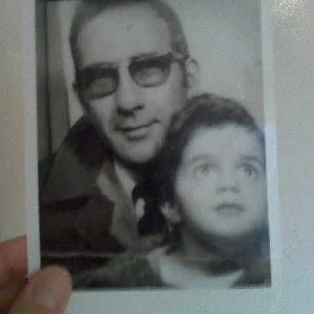 Young Najwa with her father in a family photo representing the roots and family story behind Saj Fresh Grill in Aurora, Colorado