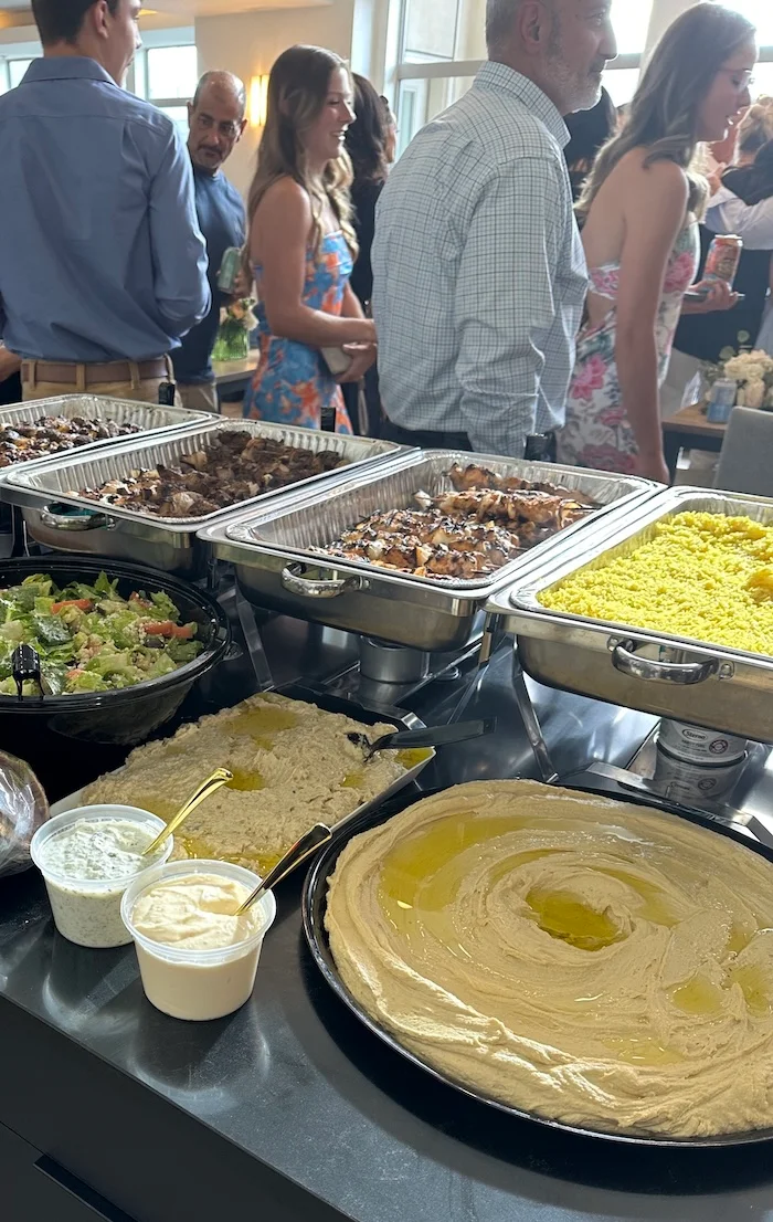 office3 Mediterranean office catering platter with grilled chicken kabobs, hummus, pita bread, and fresh salad from Saj Fresh Grill serving Aurora, Denver, and the Denver Tech Center (DTC) area.
