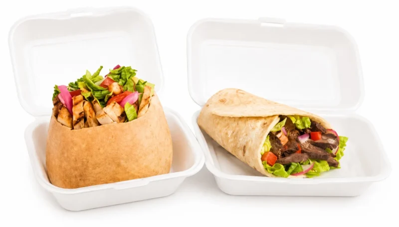 Halal shawarma wrap with fresh vegetables in saj bread